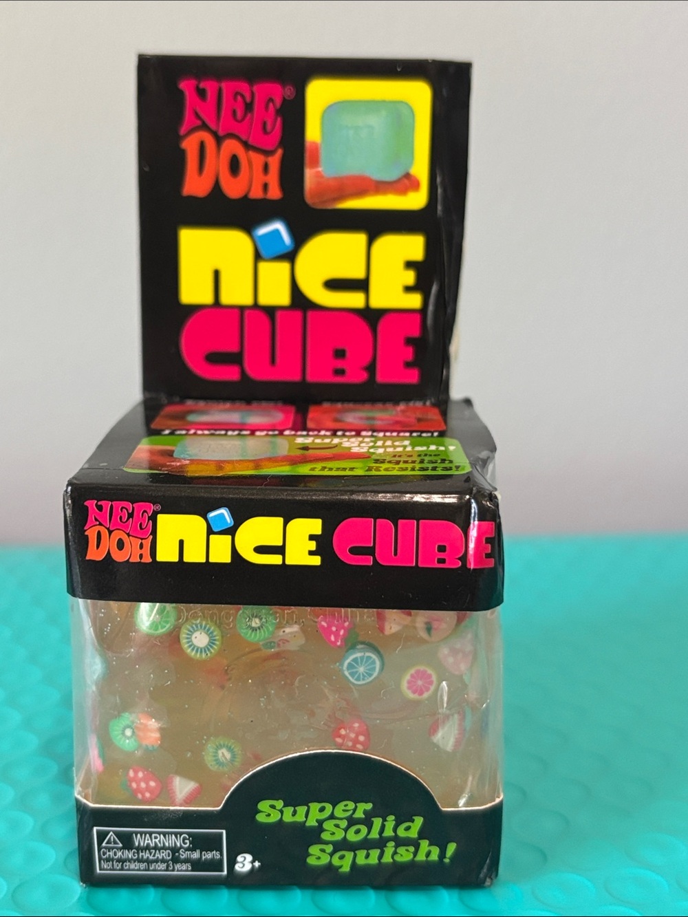 Nee Doh Nice Cube Clear Fruit Confetti Super Solid Squish - Clear